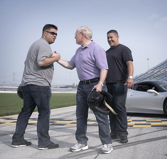 Meridian Safe Bank AE Brian Bateman conducting business meetings on a snowmobile